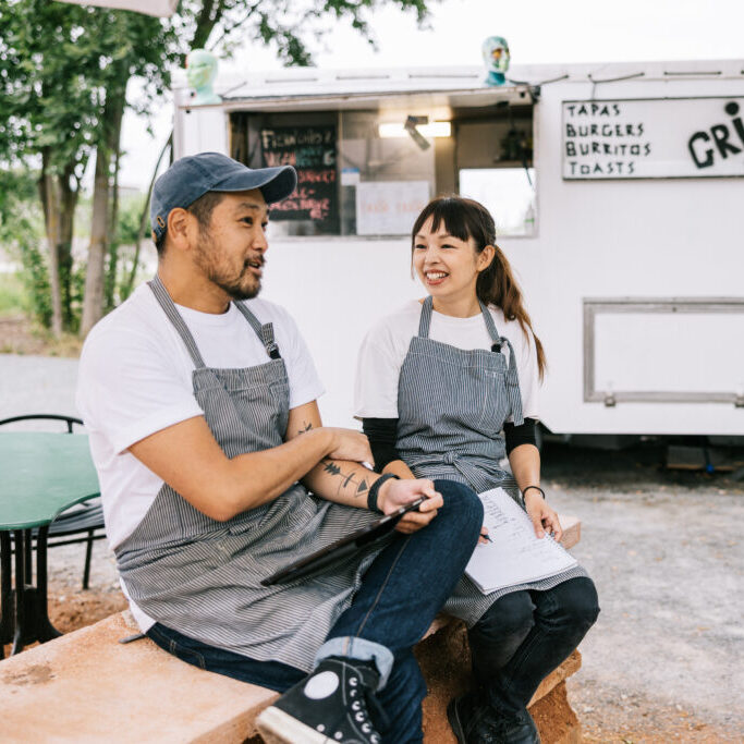 Japanese business owners, getting ready to open their food truck business.